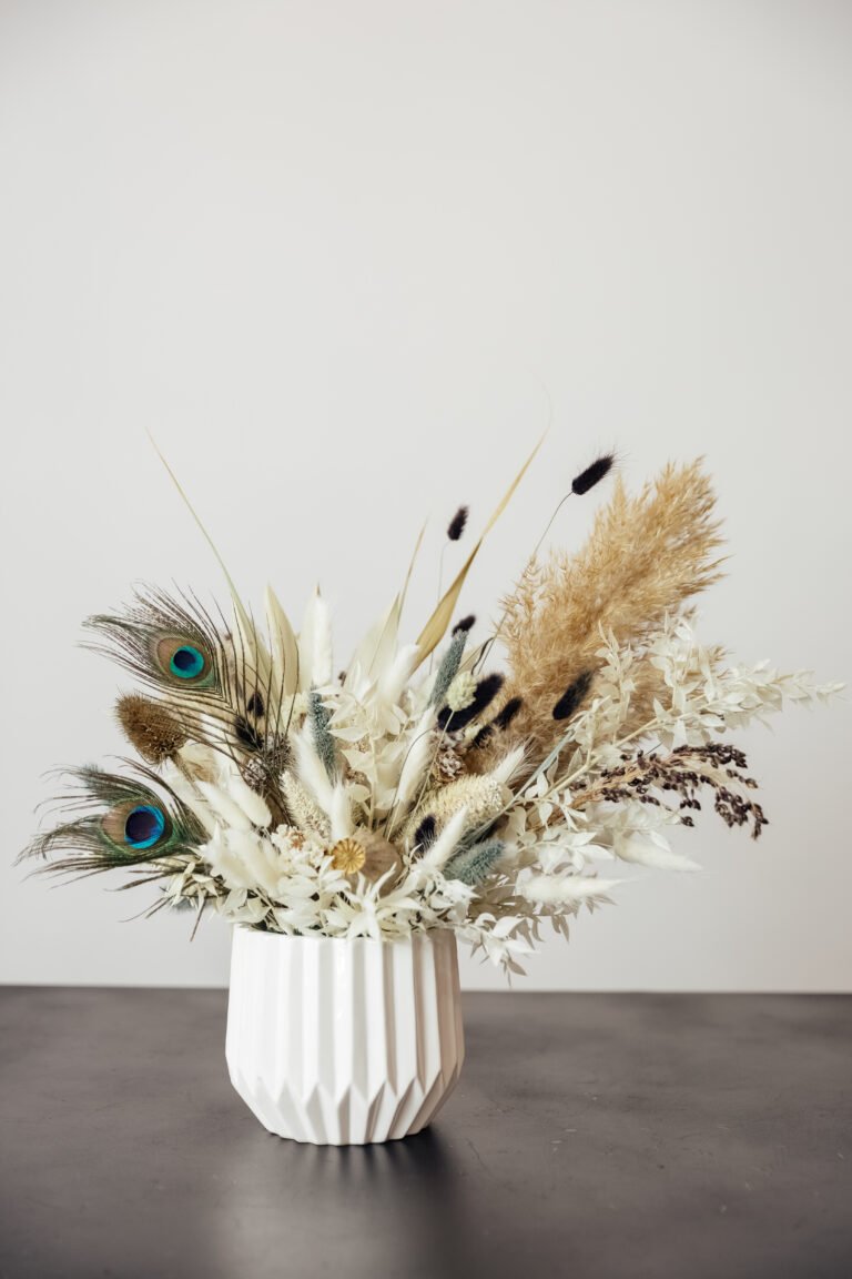 Composition dried colored flowers on a white background. Romanti